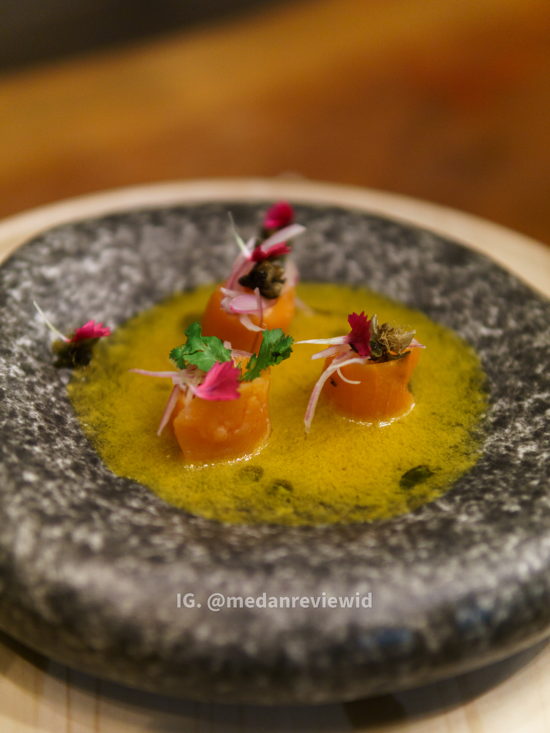 Appetizer: Smoke Salmon with radish (capers), green chili, cilantro, spicy citrus dressing & aji amarillo