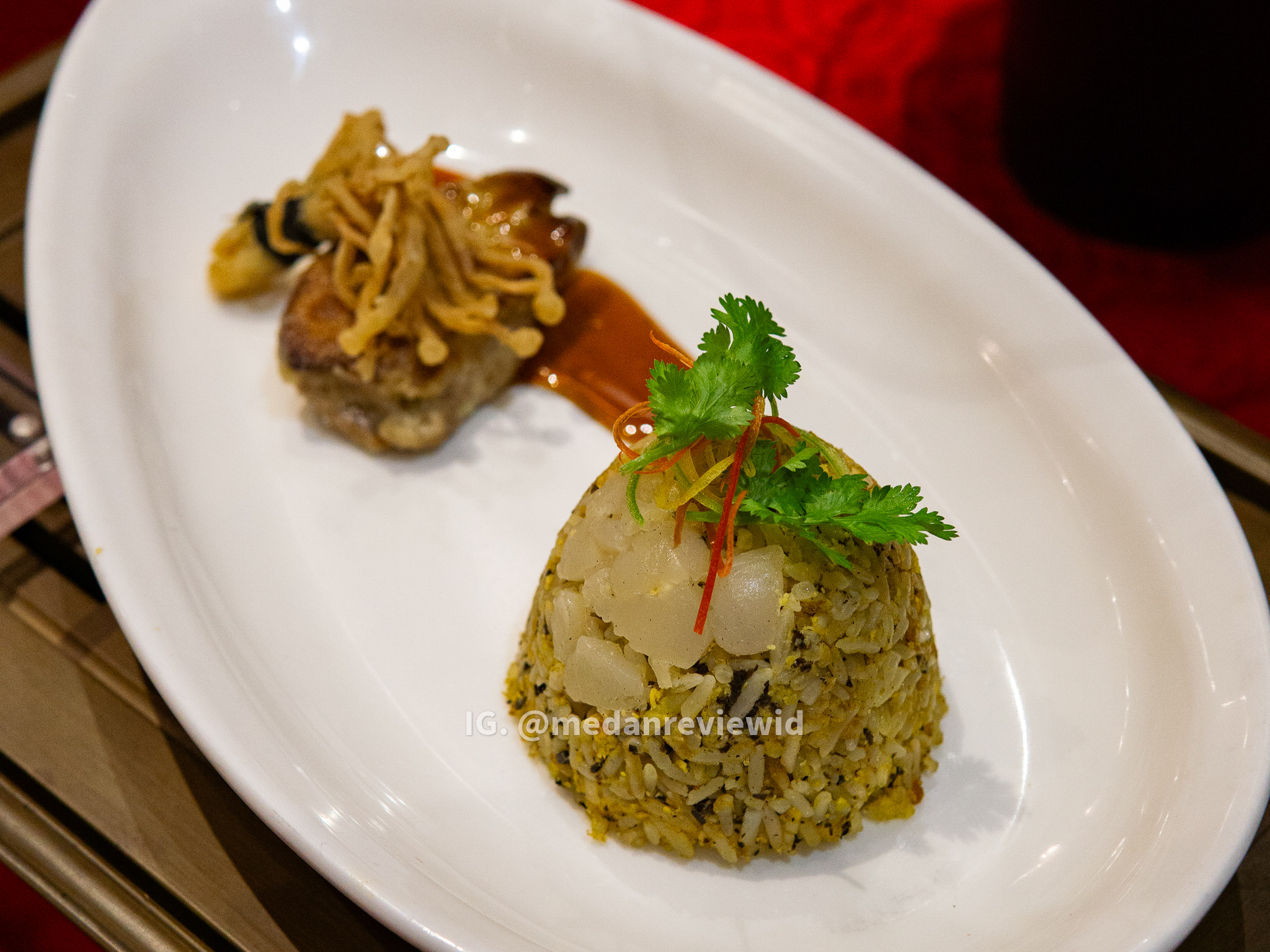 Signature Black Truffle Seafood Fried Rice with Foie Gras